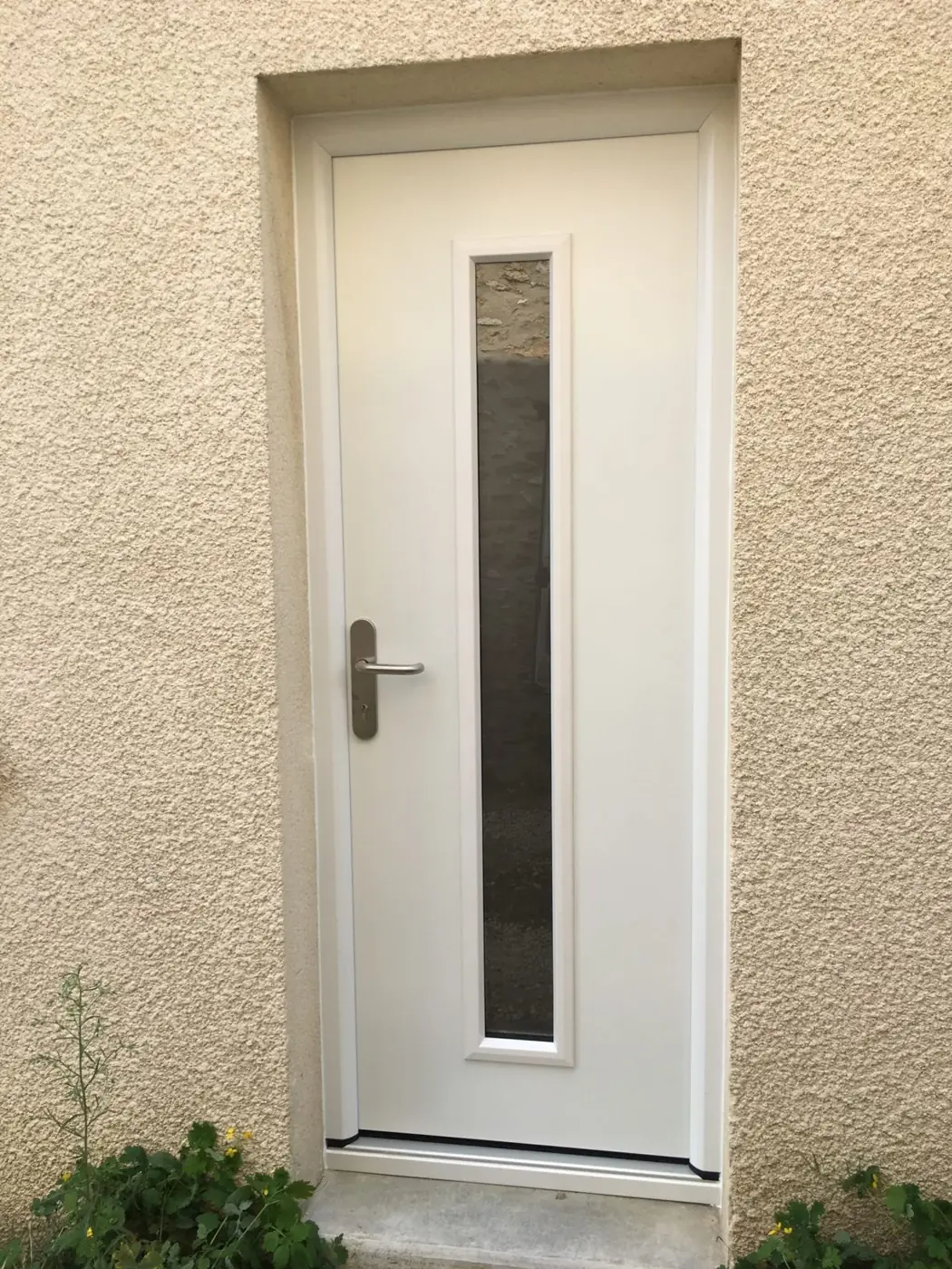 Porte d’entrée posée par Menuisol